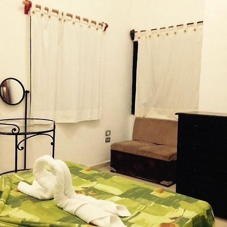 Hostal Charlys Tulum Rum bild